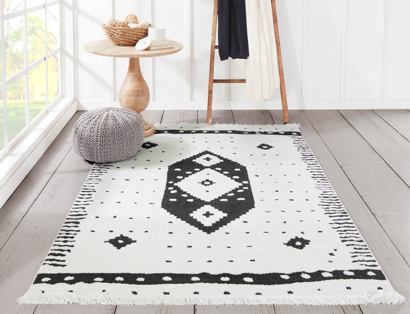 Lyra Contemporary 5'3\" x 7'2\" Area Rug in Ivory Indoor Area Rug