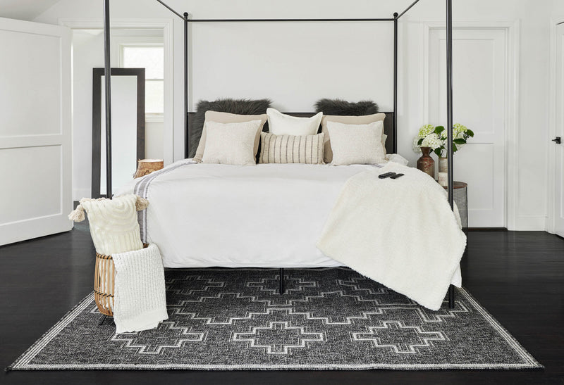 Esina Transitional 6'6\" x 9'0\" Area Rug in Black Indoor Area Rug
