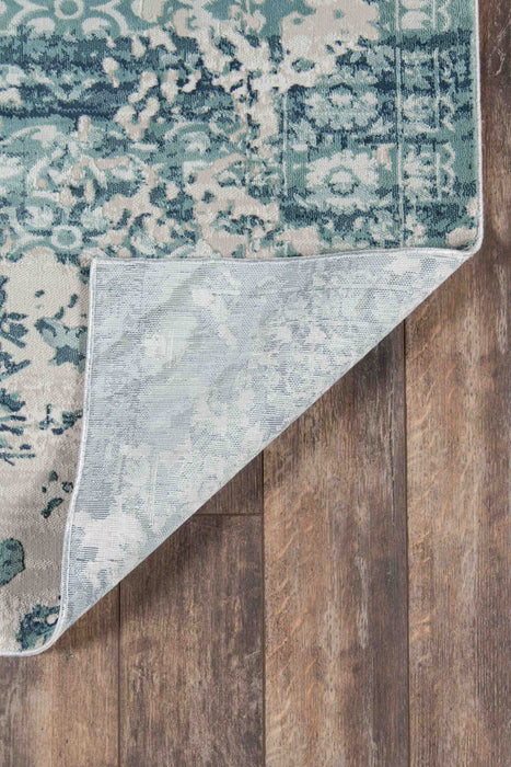 Delphine Traditional 5'1\" x 7'7\" Area Rug in Blue Indoor Area Rug