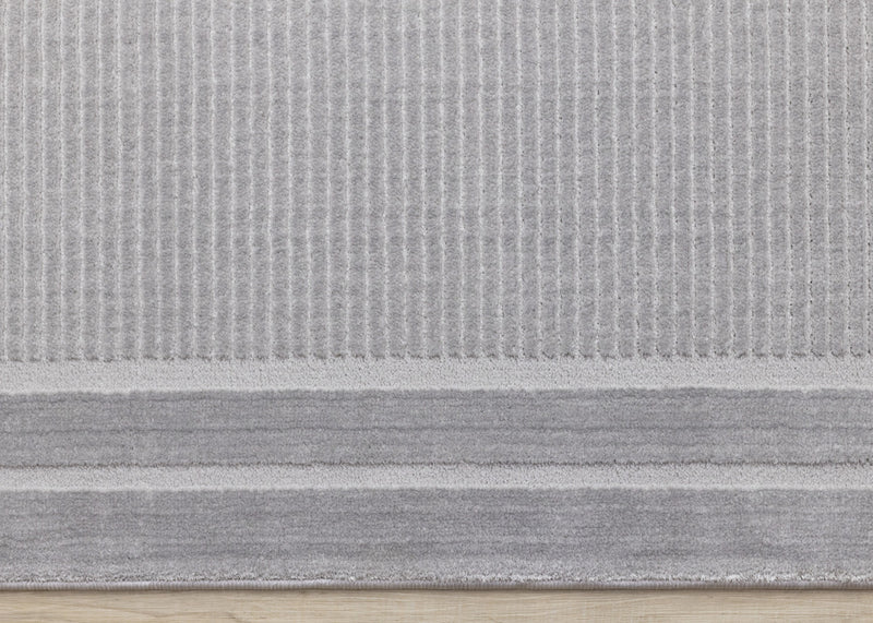Ellie High-Low Textured Soft Polyester Grey Border Area Rug - 5'3\" x 7'7\"