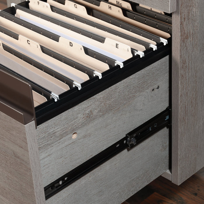 Manhattan Gate 65.98\" Commercial Grade L-Shaped Office Desk with 2-Drawers - Mystic Oak