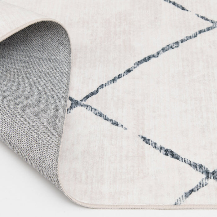 Selin Ivory Washable Area Rug - 5’ x 7’