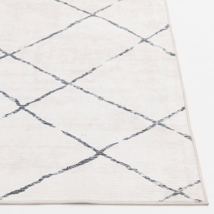 Selin Ivory Washable Area Rug - 5’ x 7’