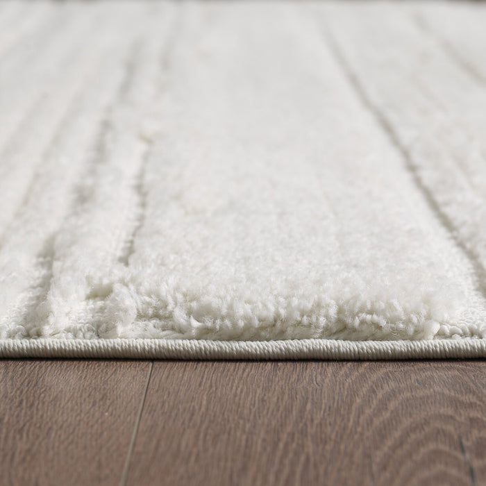 Riley Cream Abstract Area Rug - 6'3\" x 9'