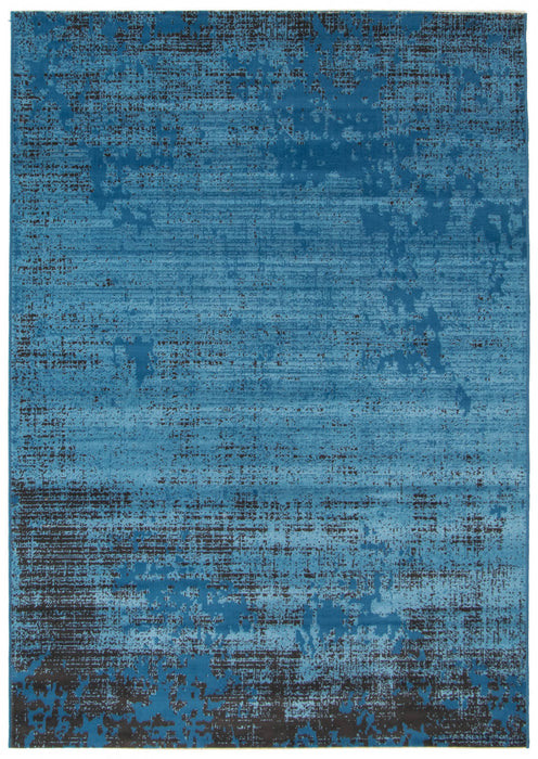 Janaki Blue 6'7\" x 9'6\" Area Rug