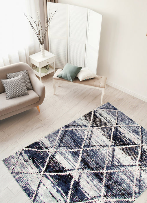 Makondo Abstract Blue Area Rug - 6'7\" x 9'6\"