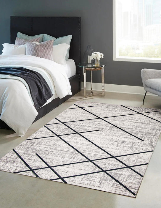 Damali Ivory/Blue Machine Washable Area Rug - 5'0\" x 7'0\"