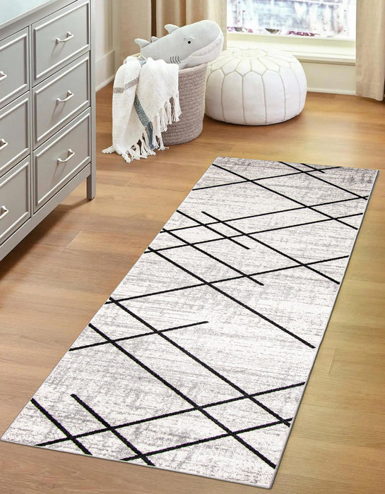 Damali Ivory/Black Machine Washable Area Rug - 2'6\" x 8'0\"