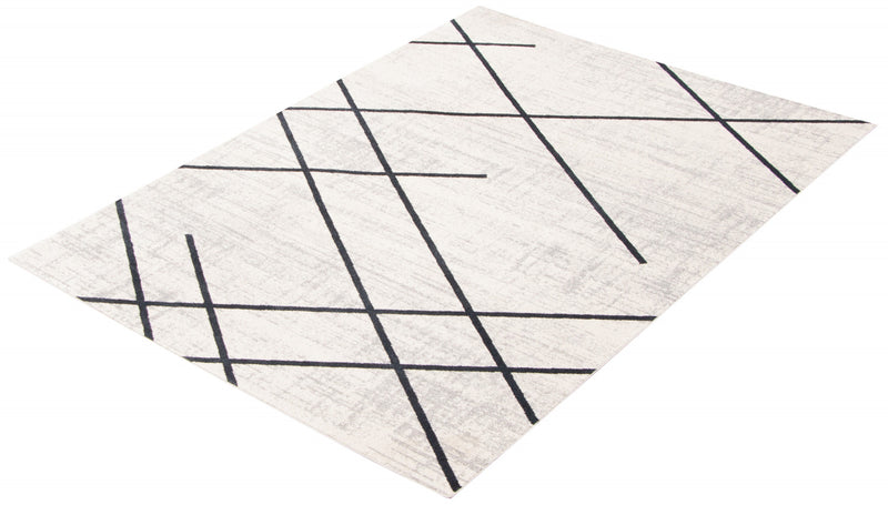 Damali Ivory/Blue Machine Washable Area Rug - 5'0\" x 7'0\"