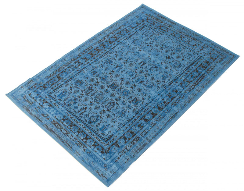Awena Blue 4'7\" x 6'7\" Area Rug