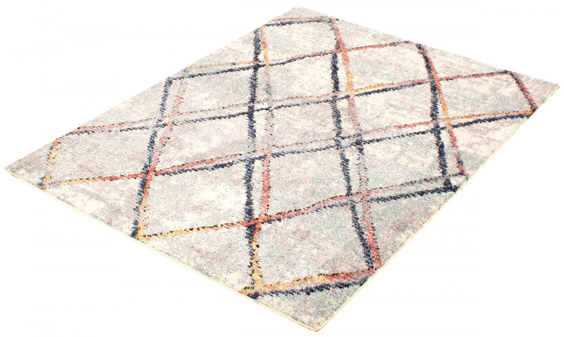 Makondo Abstract Ivory Area Rug - 6'7\" x 9'6\"
