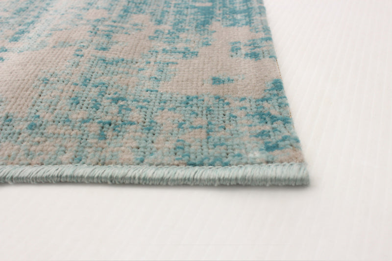 Janaki Teal 6'7\" x 9'6\" Area Rug