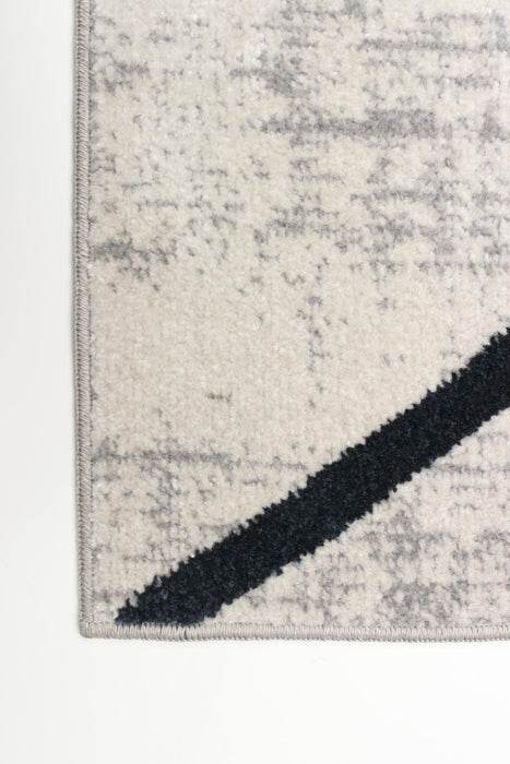 Damali Ivory/Blue Machine Washable Area Rug - 3'0\" x 5'0\"