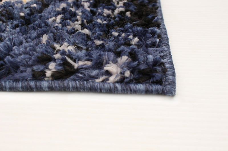 Makondo Abstract Navy Blue Area Rug - 6'7\" x 9'6\"
