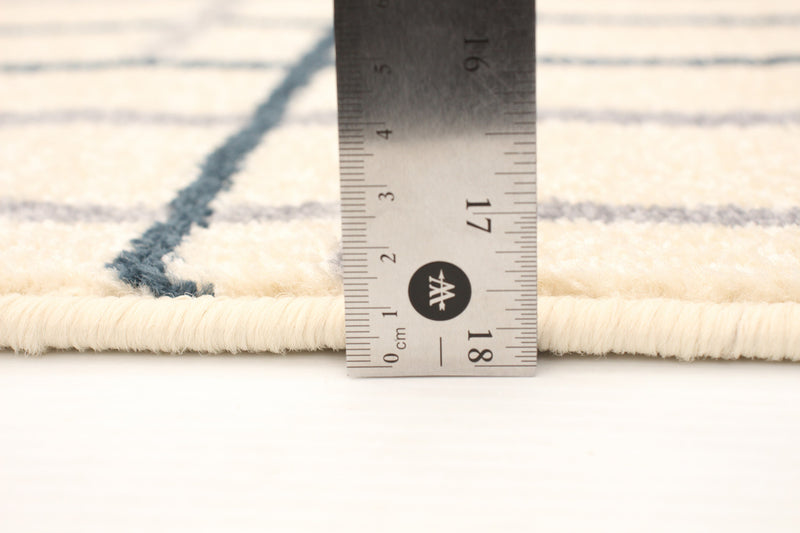 Taite Cream-Prol Area Rug - 3'11\" x 5'7\"