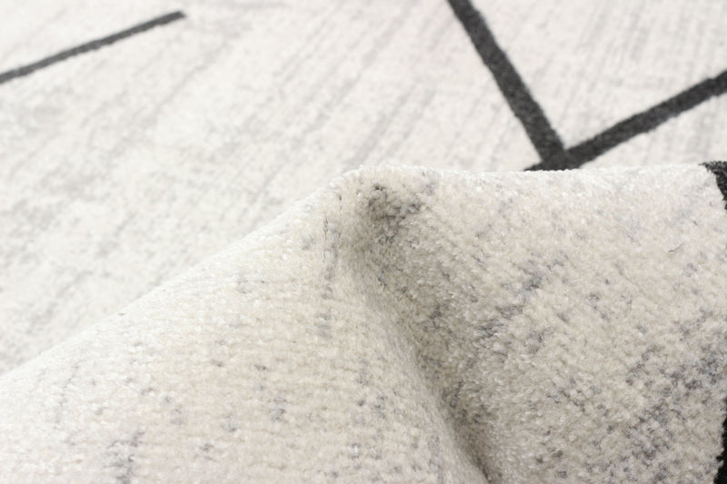 Damali Ivory/Black Machine Washable Area Rug - 6'0\" x 9'0\"