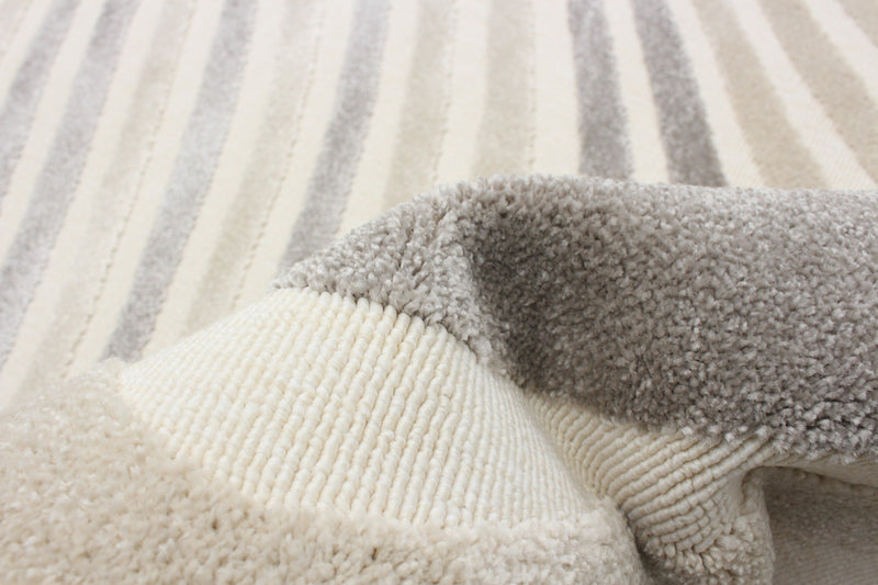 Nikkos Ivory 4'7\" x 6'7\" Area Rug