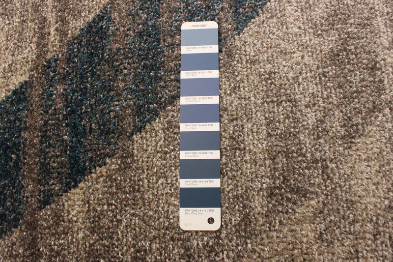 Korra Ivory / Blue 6'7\" x 9'6\" Area Rug