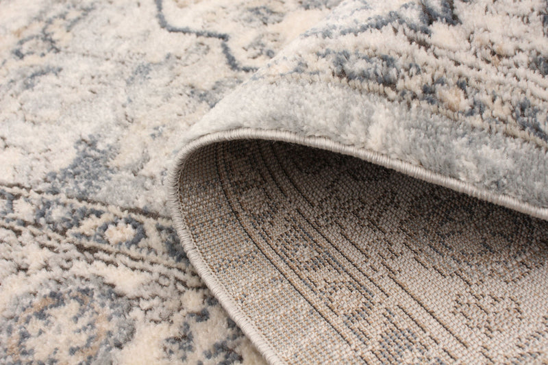 Octavian Tabriz Blue-Ivory Area Rug - 3'11\" x 5'11\"