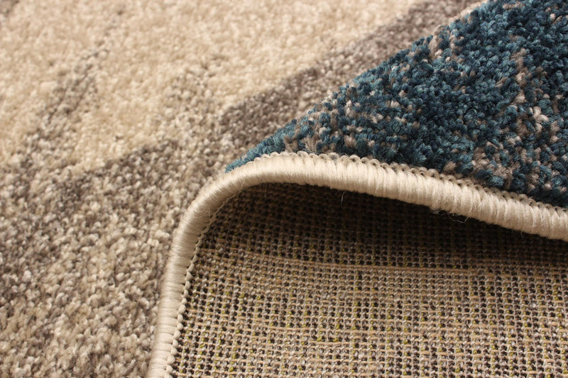 Korra Ivory / Blue 6'7\" x 9'6\" Area Rug