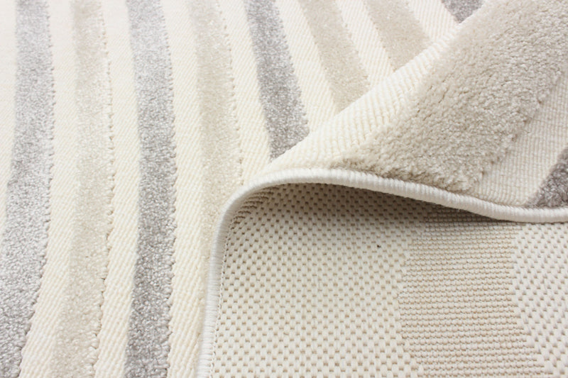 Nikkos Ivory 4'7\" x 6'7\" Area Rug