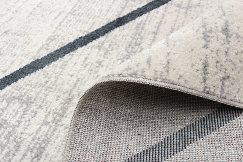 Damali Ivory/Blue Machine Washable Area Rug - 5'0\" x 7'0\"