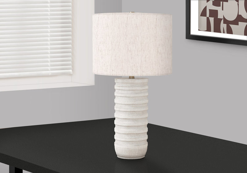 28\" Cream Textured Resin Table Lamp with Ivory Shade